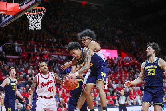 Jon Teske (15), Zavier Simpson (3), Eli Brooks (55), and Brandon Johns Jr. (23)