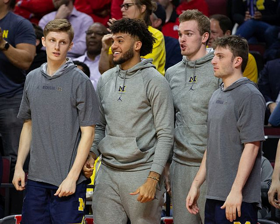 Cole Bajema (22), Isaiah Livers (2), Jaron Faulds (44), and Luke Wilson (32)