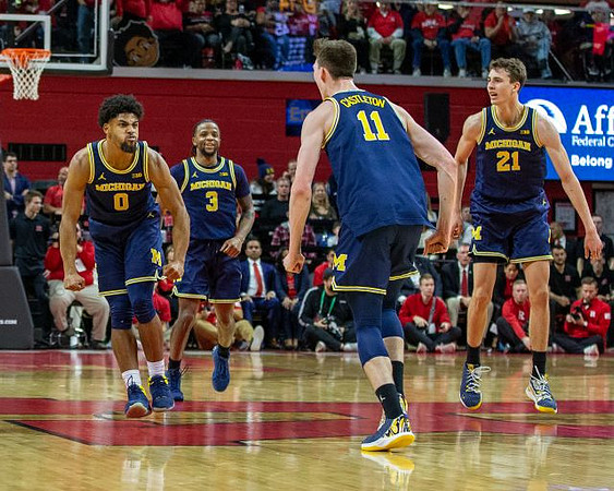 David DeJulius (0), Zavier Simpson (3), Colin Castleton (11), and Franz Wagner (21)