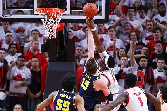Eli Brooks (55) and Jon Teske (15)