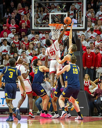Zavier Simpson (3), Brandon Johns Jr. (23), Franz Wagner (21), and Jon Teske (15)