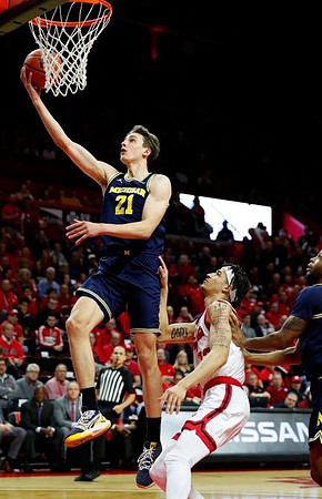 Franz Wagner (21) and Zavier Simpson (3)