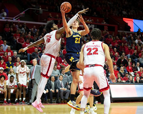 Franz Wagner (21) and Rutgers Head Coach Steve Pikiell