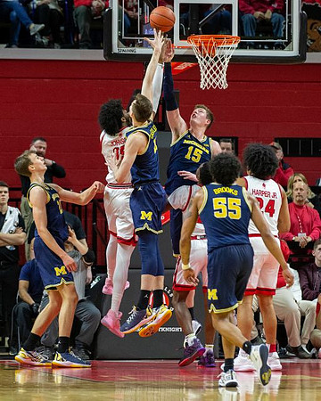 Franz Wagner (21), Colin Castleton (11), Jon Teske (15), and Eli Brooks (55)
