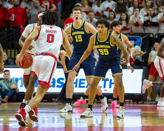 Jon Teske (15), Eli Brooks (55), and Brandon Johns Jr. (23)
