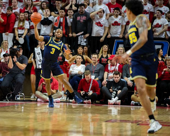Zavier Simpson (3) and Eli Brooks (55)