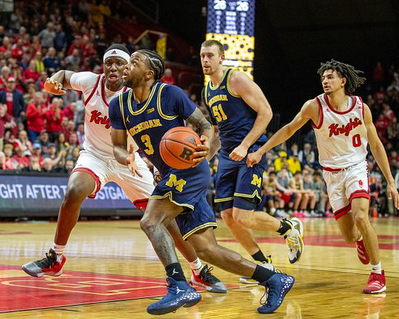 Zavier Simpson (3) and Austin Davis (51)