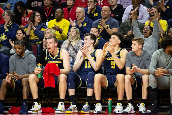 Zavier Simpson (3), Austin Davis (51), Colin Castleton (11), Adrien Nunez (5), Cole Bajema (22), and Isaiah Livers (2)