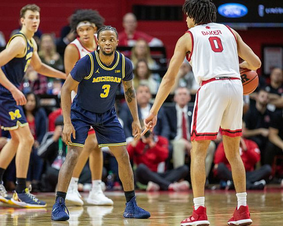 Franz Wagner (21) and Zavier Simpson (3)