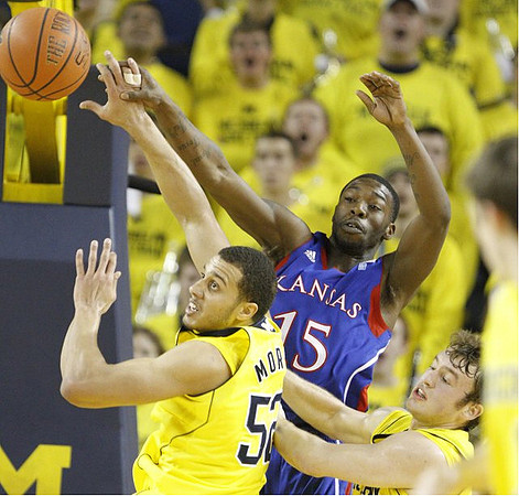 Jordan Morgan (52) and Zack Novak (0)