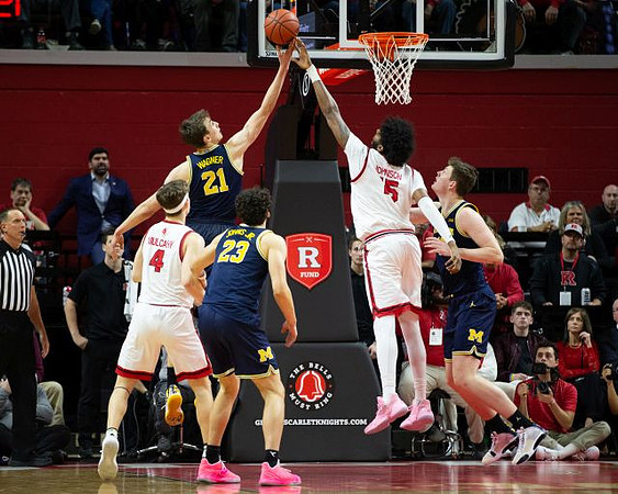 Franz Wagner (21), Brandon Johns Jr. (23), and Jon Teske (15)