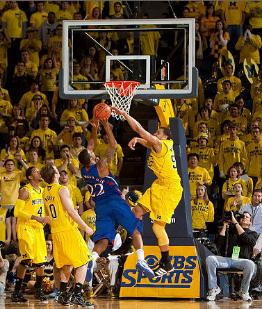 Darius Morris (4), Zack Novak (0), and Jordan Morgan (52)