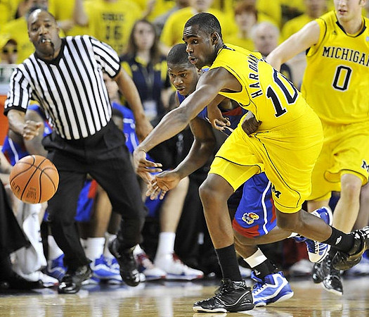 Tim Hardaway Jr. (10) and Zack Novak (0)