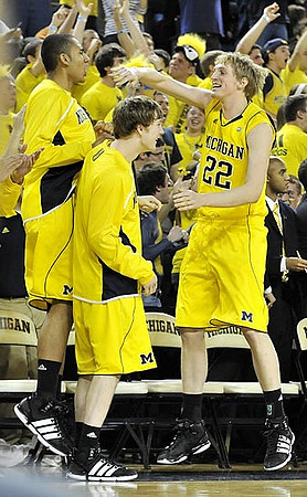 Jon Horford (15), Matt Vogrich (13), and Blake McLimans (22)