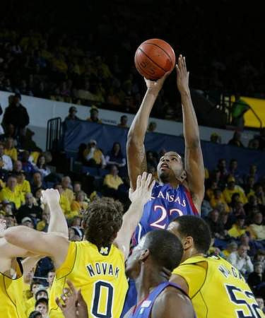 Zack Novak (0) and Jordan Morgan (52)