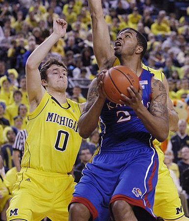 Zack Novak (0) and Jordan Morgan (52)