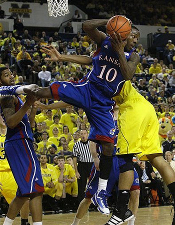 Matt Vogrich (13) and Jordan Morgan (52)