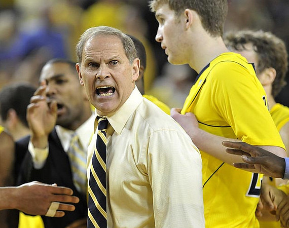 LaVall Jordan, John Beilein, Evan Smotrycz (23), and Zack Novak (0)