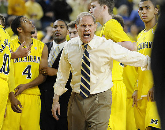 Tim Hardaway Jr. (10), Darius Morris (4), LaVall Jordan, John Beilein, Evan Smotrycz (23), and Jon Horford (15)