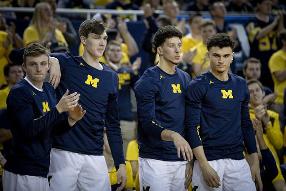 Luke Wilson (32), Colin Castleton (11), Brandon Johns Jr. (23), and Adrien Nunez (5)