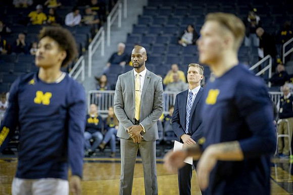 Jordan Poole (2), Deandre Haynes, Luke Yaklich, and Ignas Brazdeikis (13)