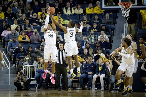 Eli Brooks (55), Zavier Simpson (3), Isaiah Livers (4), and Ignas Brazdeikis (13)