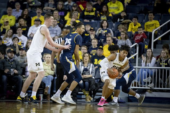 Jon Teske (15) and Eli Brooks (55)