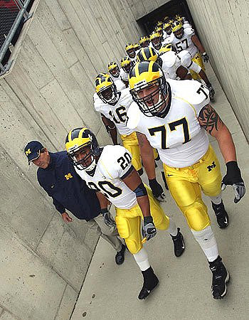 Lloyd Carr, Michael Hart, Jake Long, Adrian Arrington, and Adam Kraus