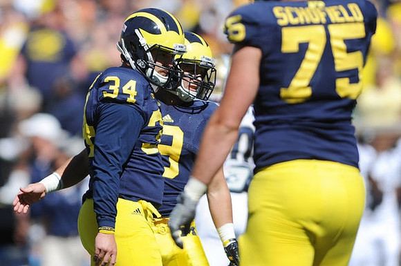 Brendan Gibbons (34), Drew Dileo (9), and Michael Schofield (75)