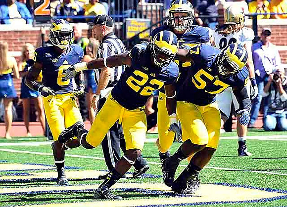 Raymon Taylor (6), Jarrod Wilson (22), and Frank Clark (57)