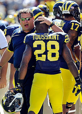 Brady Hoke, Fitzgerald Toussaint (28), and Jeremy Jackson (17)