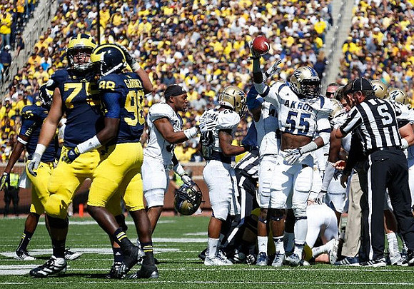 Michael Schofield (75) and Devin Gardner (98)