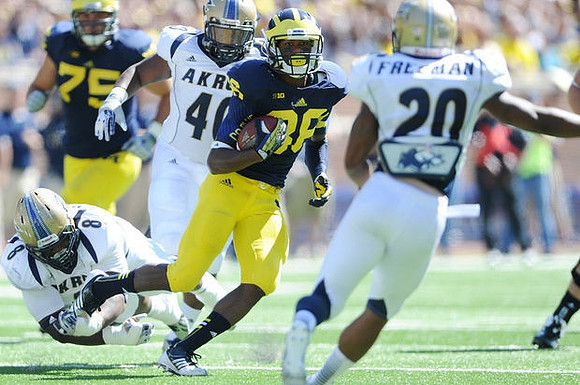 Michael Schofield (75) and Fitzgerald Toussaint (28)