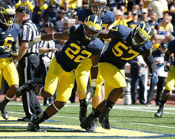 Raymon Taylor (6), Jarrod Wilson (22), Brennen Beyer (97), and Frank Clark (57)