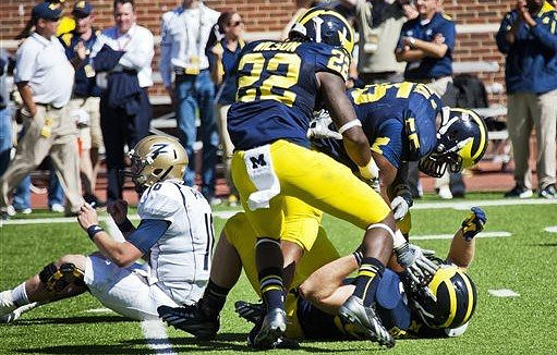 Jarrod Wilson (22), Jibreel Black (55), and Brennen Beyer (97)