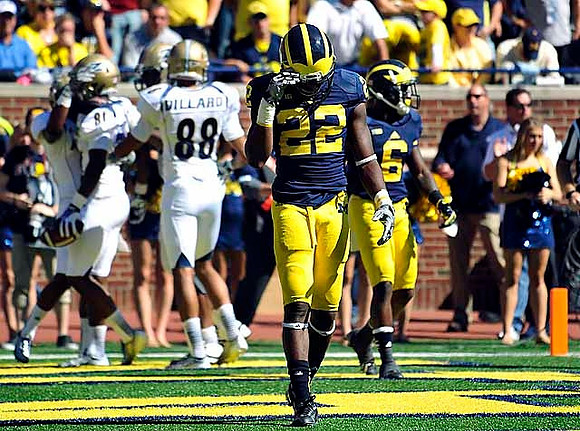 Jarrod Wilson (22) and Raymon Taylor (6)