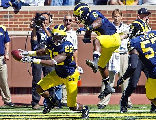 Jarrod Wilson (22), Raymon Taylor (6), and Frank Clark (57)