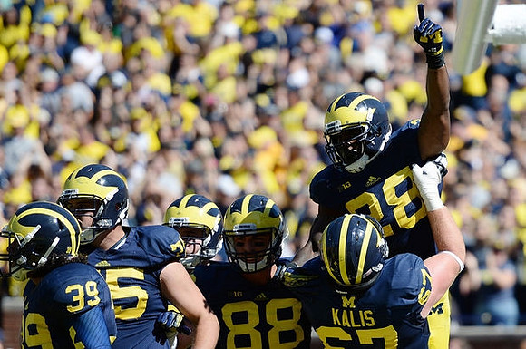 Sione Houma (39), Michael Schofield (75), Jake Butt (88), Kyle Kalis (67), and Fitzgerald Toussaint (28)
