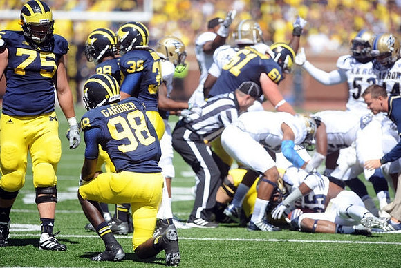 Michael Schofield (75), Devin Gardner (98), Fitzgerald Toussaint (28), Joe Bolden (35), and Graham Glasgow (61)