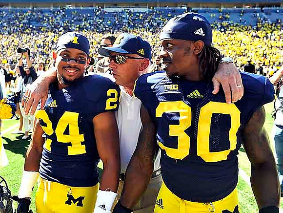 Delonte Hollowell (24) and Thomas Gordon (30)