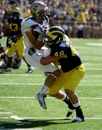 Chris Wormley (43) and Desmond Morgan (48)
