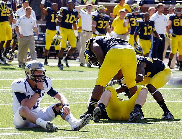 Jibreel Black (55), Brennen Beyer (97), and Jarrod Wilson (22)