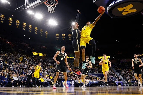 Terrance Williams II (5), Dug McDaniel (0), and Will Tschetter (42)