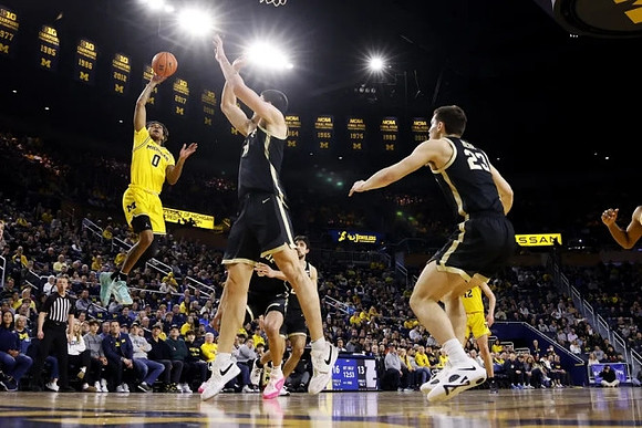 Dug McDaniel (0) and Will Tschetter (42)