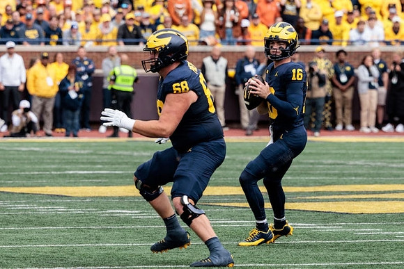 Josh Priebe (68) and Davis Warren (16)
