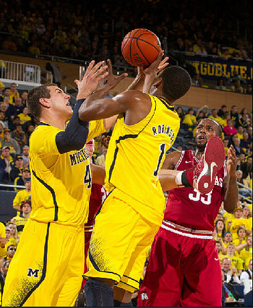 Mitch McGary (4) and Glenn Robinson III (1)