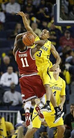 Trey Burke (3) and Mitch McGary (4)