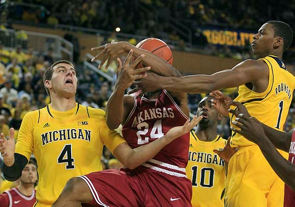 Mitch McGary (4), Tim Hardaway Jr. (10), and Glenn Robinson III (1)