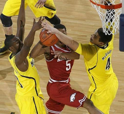 Tim Hardaway Jr. (10) and Mitch McGary (4)