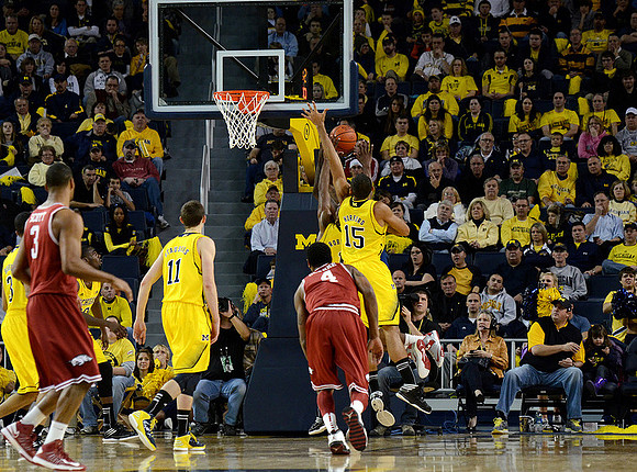 Trey Burke (3), Nik Stauskas (11), and Jon Horford (15)